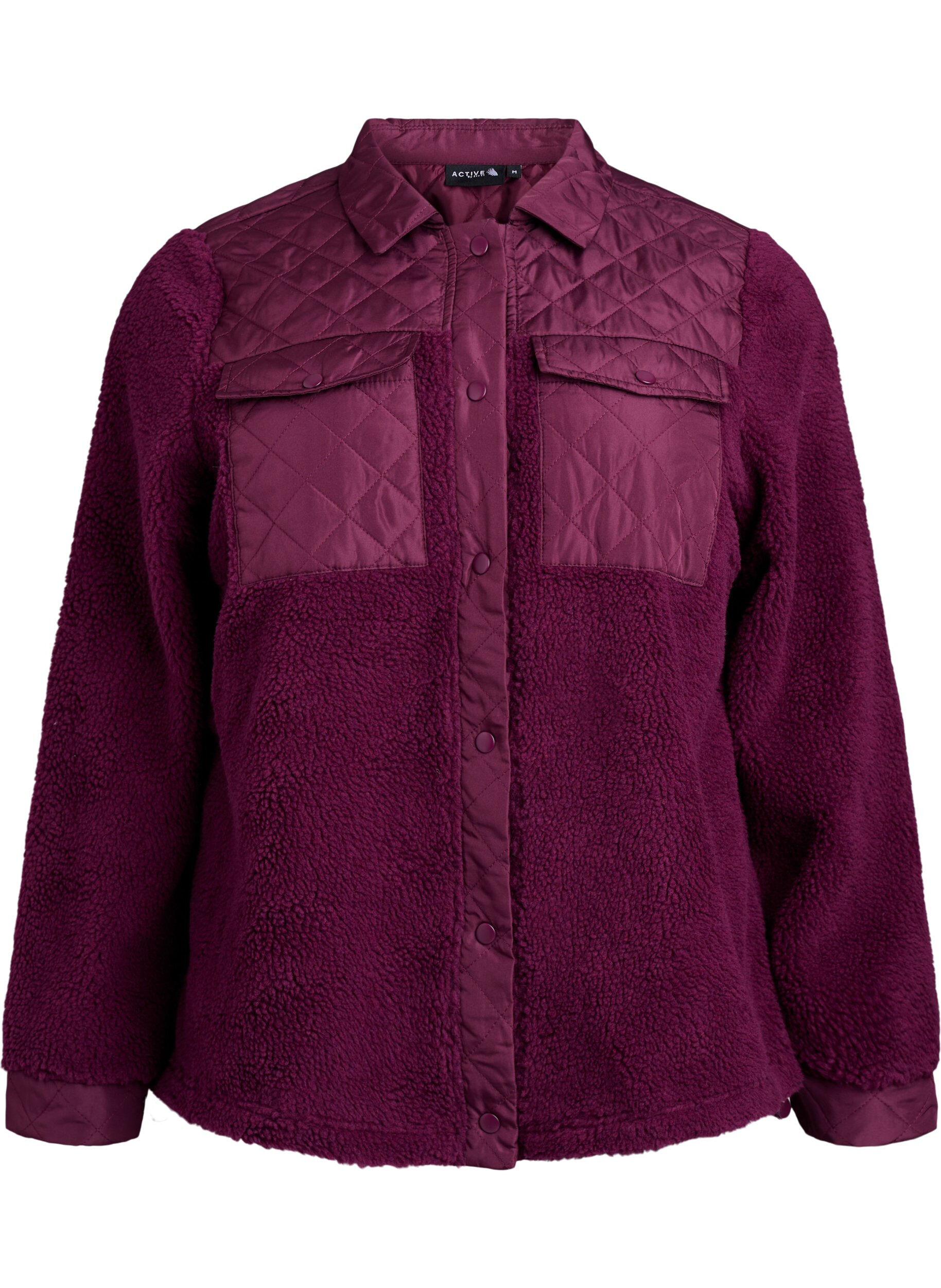 Fleecejacka med quiltade detaljer