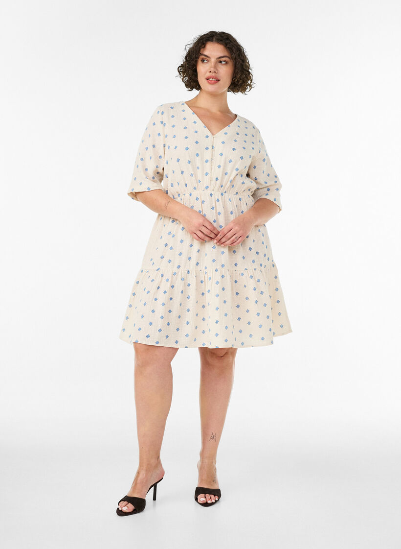 M&ouml;nstrad kl&auml;nning i bomull med res&aring;r i midjan, Beige, Model image number 1