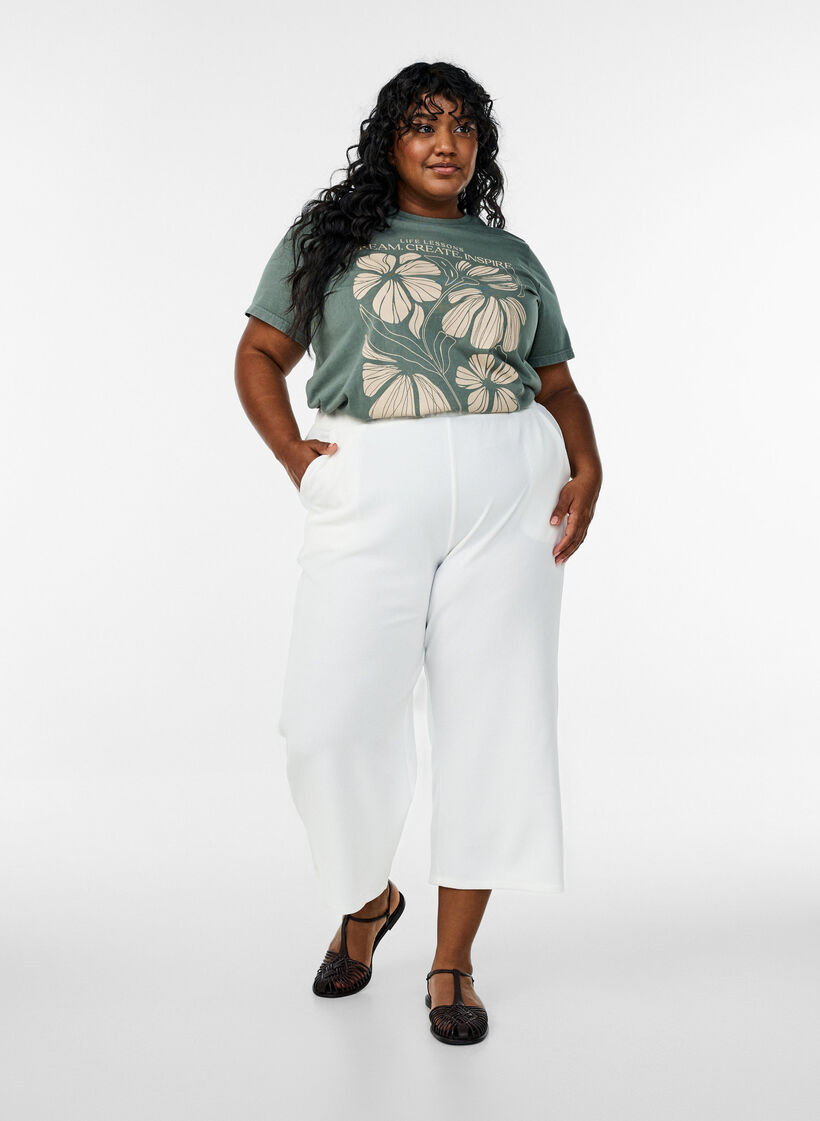 T-shirt i ekologisk bomull med text och blommigt tryck, Grön, Model image number 1