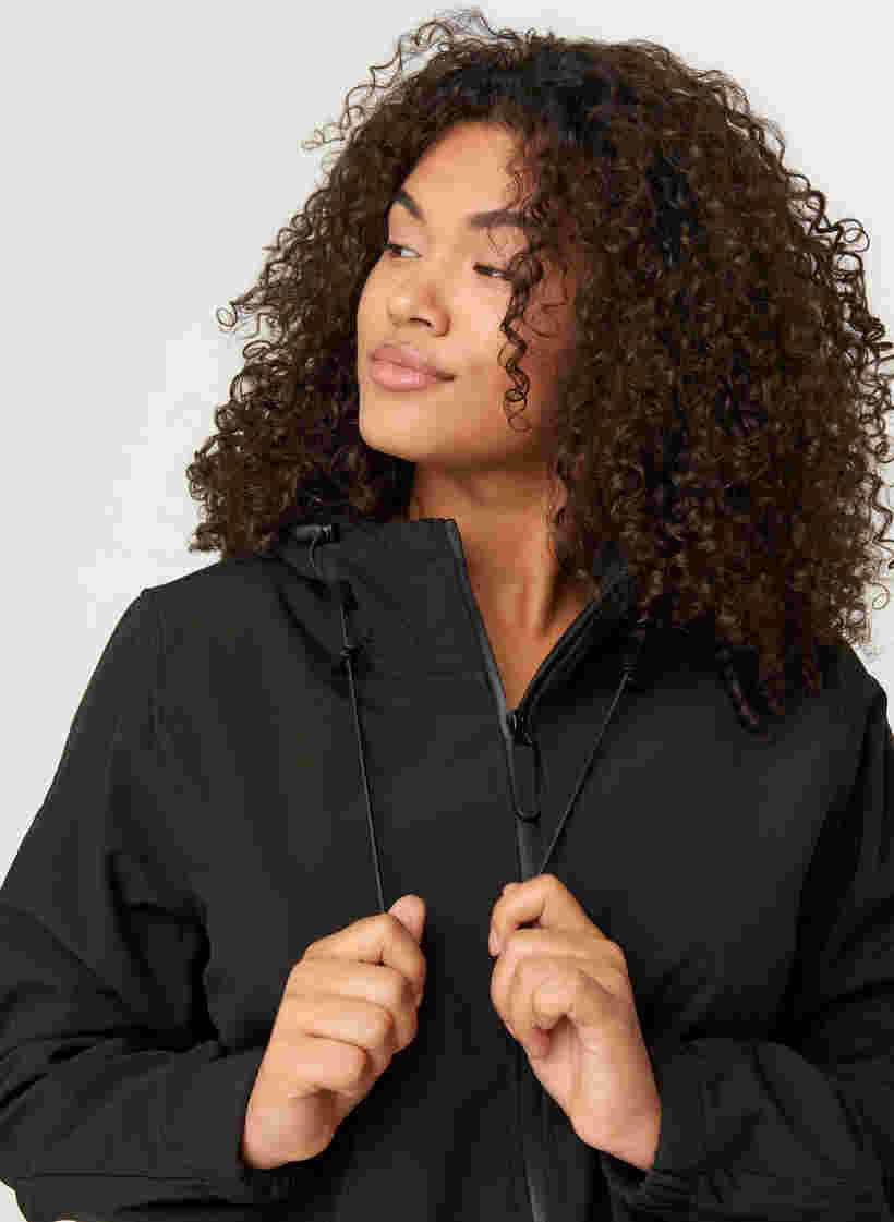 Kort softshell jacka med luva, Black, Model image number 4