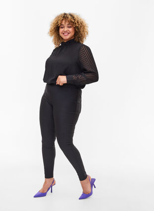 Croppade, glansiga leggings med bakfickor, Black, Model image number 2