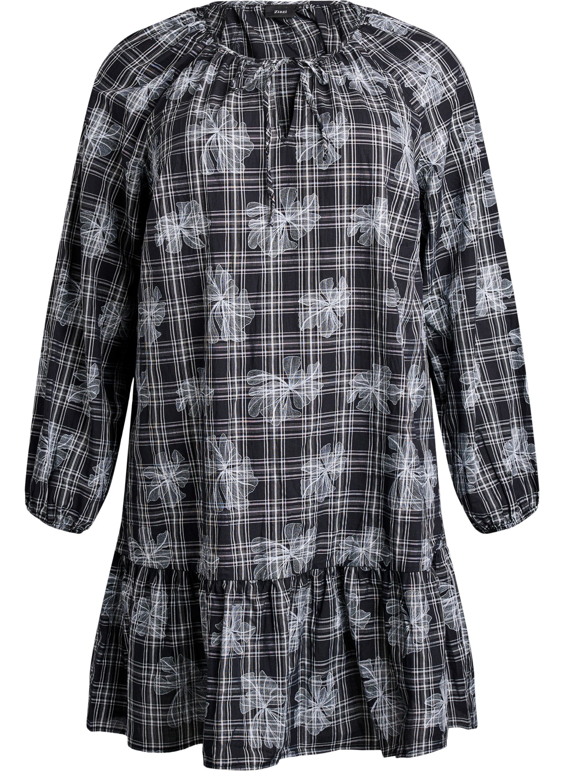 Kort kl&auml;nning med rutigt och blommigt m&ouml;nster