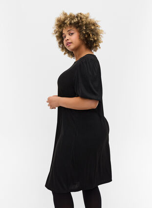 Glittrig klänning med korta ballongärmar, Black, Model image number 1