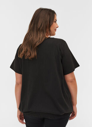 T-shirt i ekologisk bomull med smock i nederkant, Black, Model image number 1