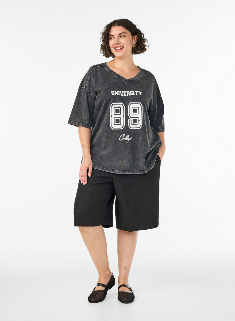 Oversized t-shirt i ekologisk bomull med collegetryck, Svart, Model image number 1