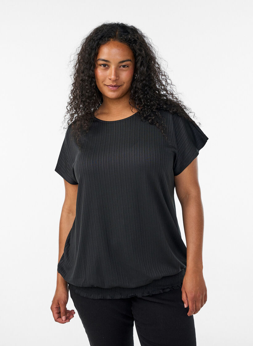 Blus i jersey med texturerade r&auml;nder och smock i nederkanten, Svart, Model image number 0