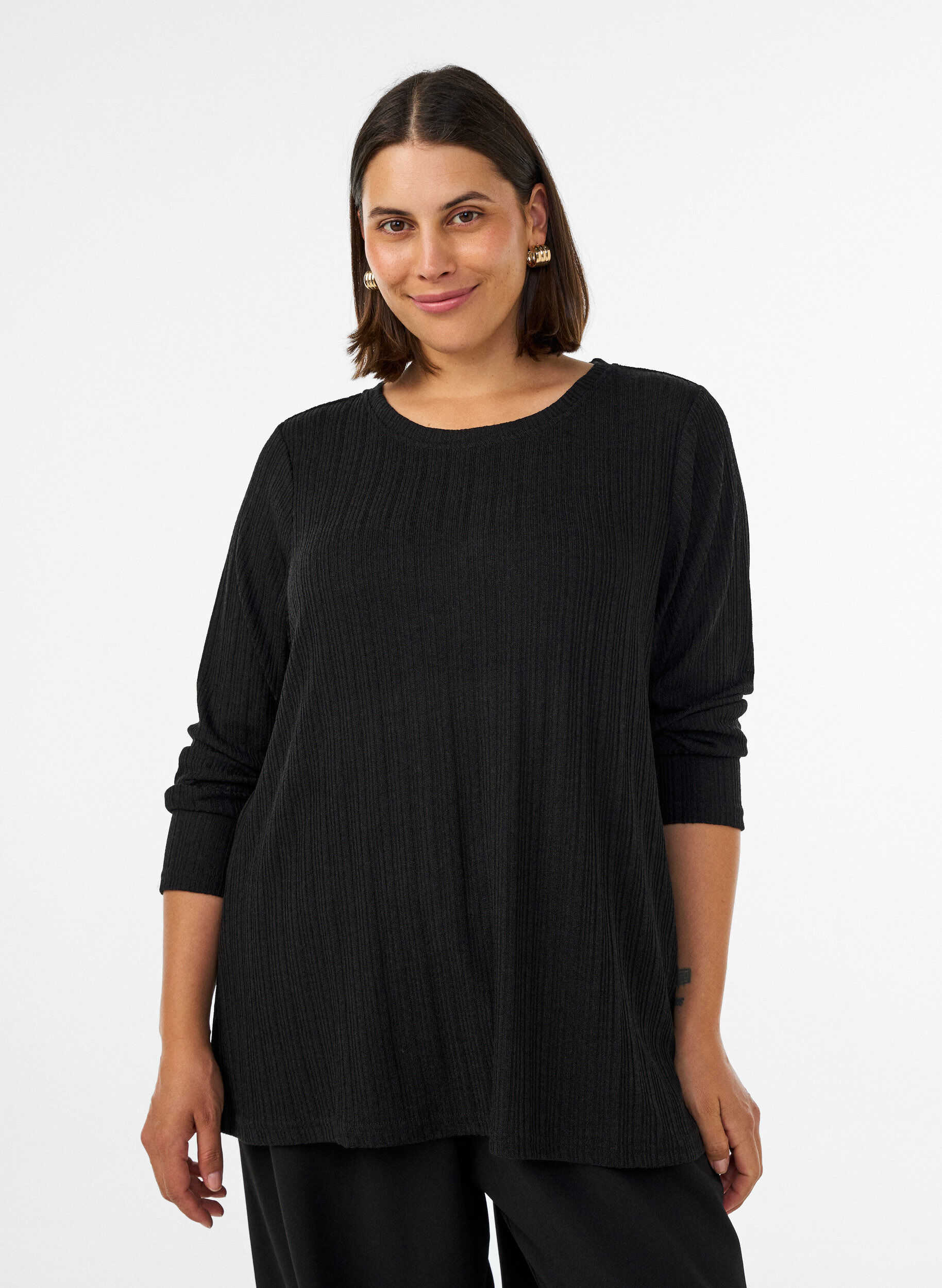 Jerseyblus med ribbstruktur och l&aring;nga &auml;rmar, Svart, Model