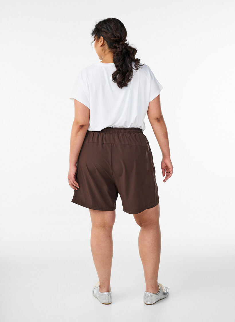 Tr&auml;ningsshorts med innershorts och en mobilficka, Brun, Model image number 2