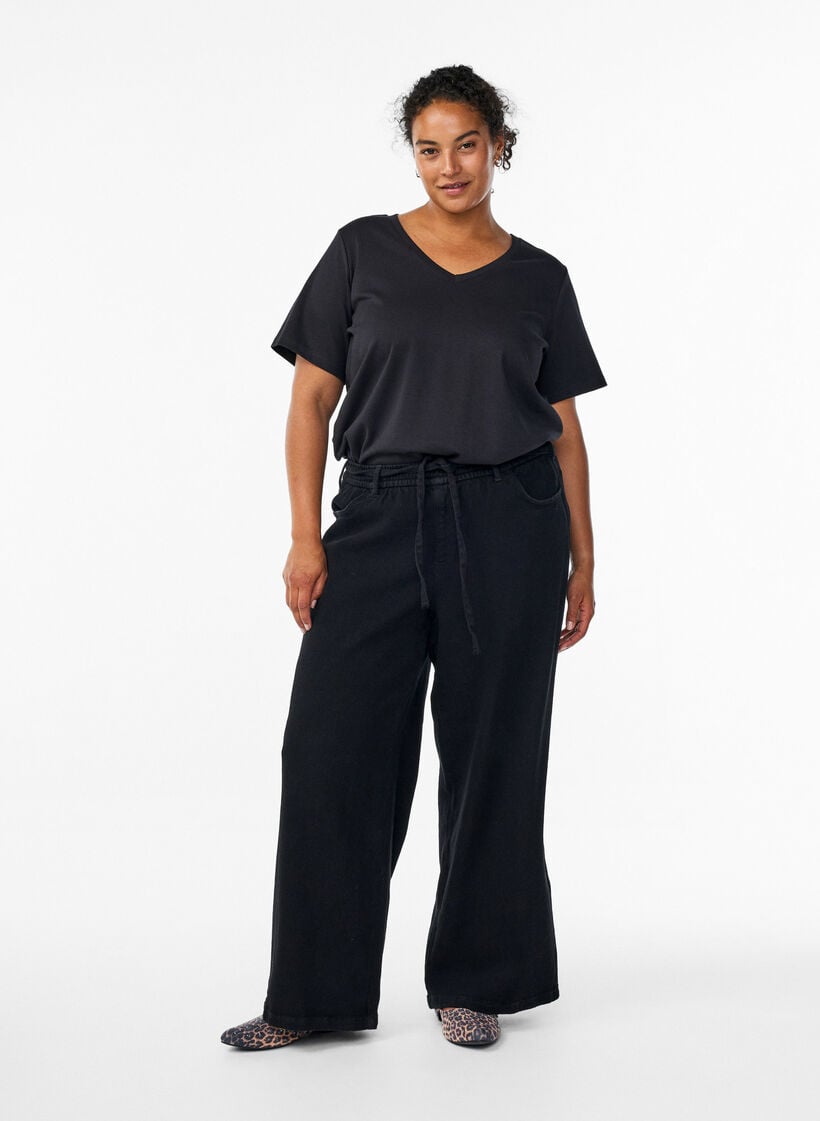 Jeans med l&ouml;s passform, res&aring;r och dragsko, Svart, Model image number 0