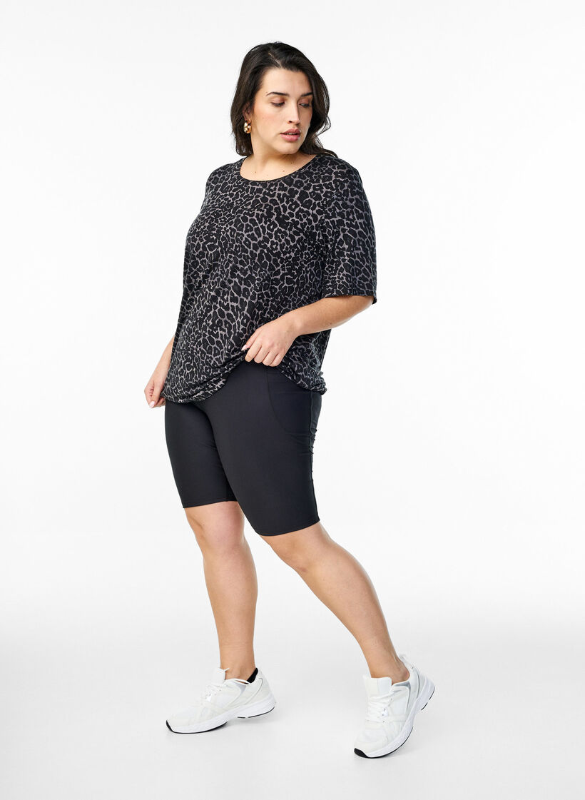 Figurnära shorts med sidofickor, Svart, Model image number 1