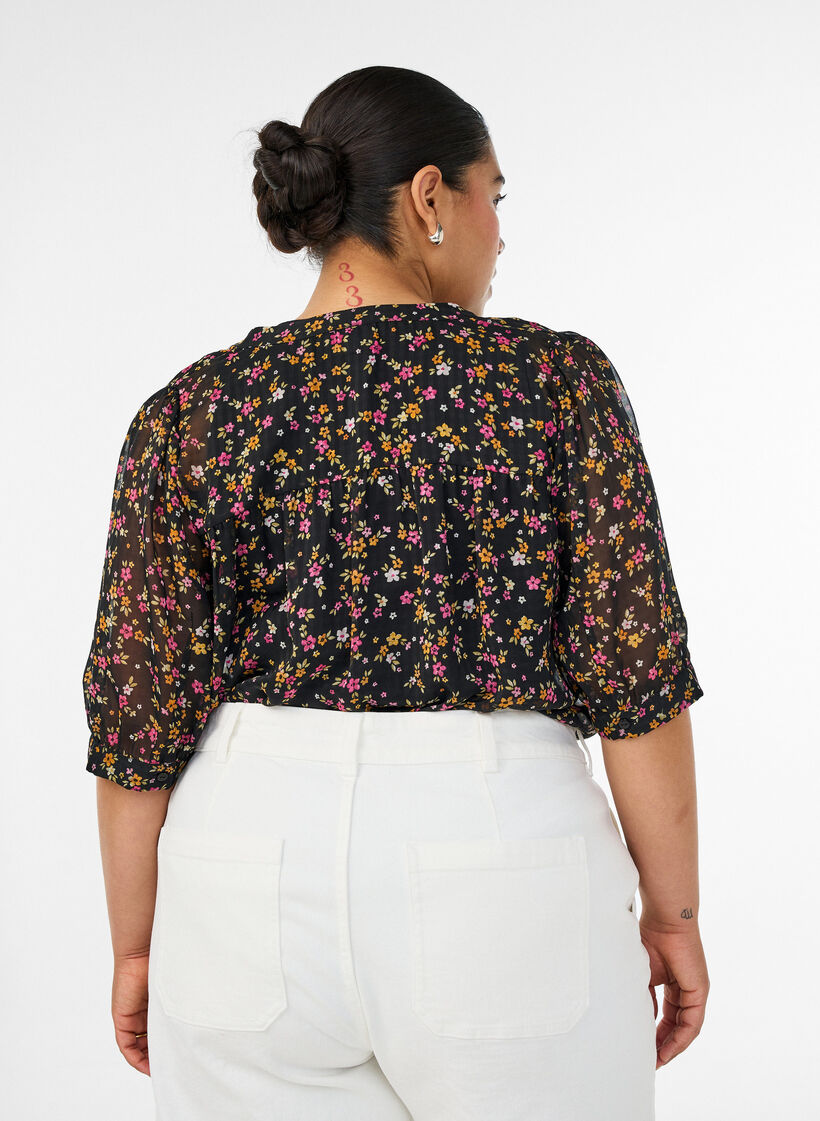 Blus med blommigt m&ouml;nster och v-ringning, Svart, Model image number 2